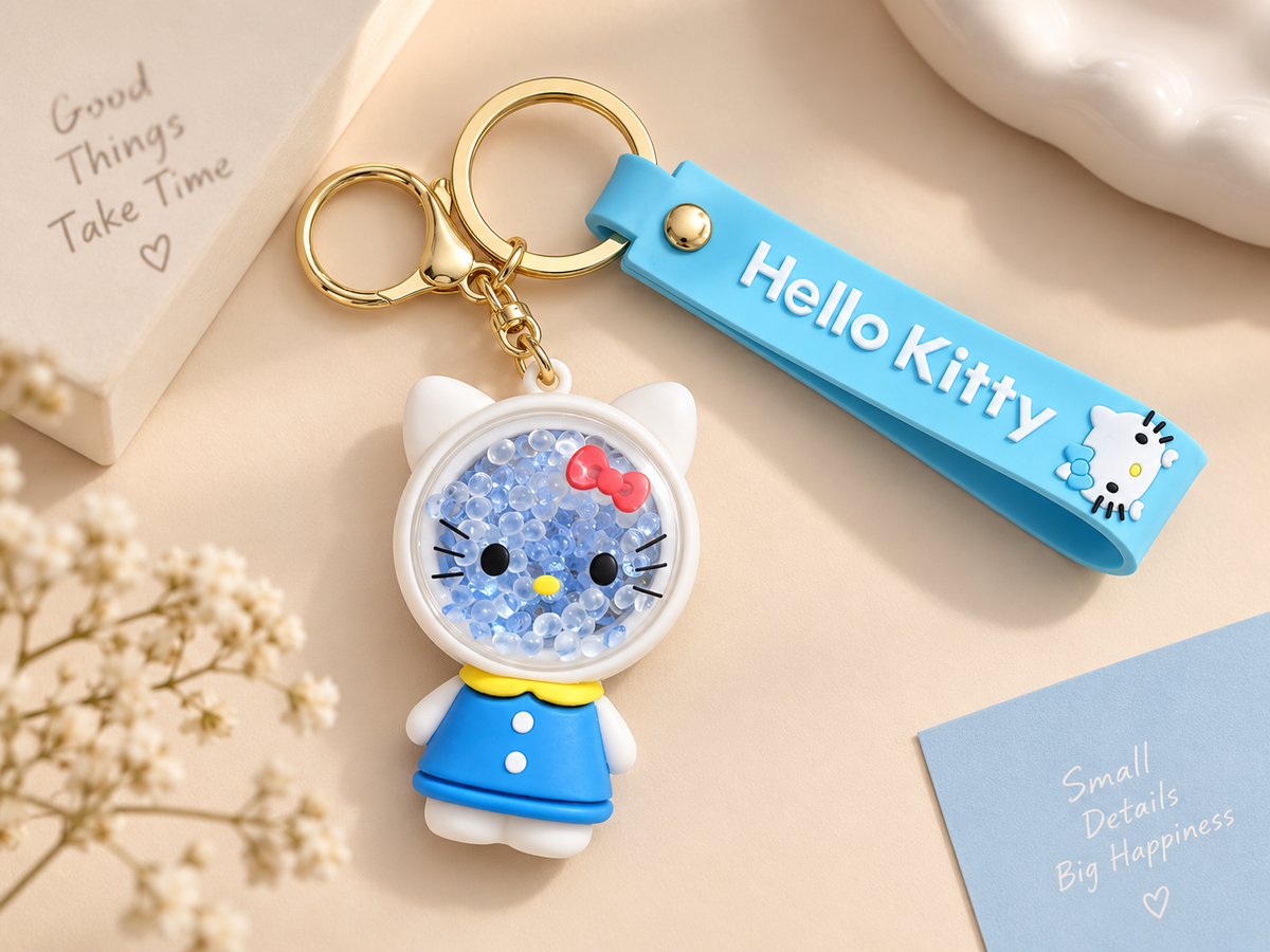 Hello Kitty Blue Shaker Keychain – ميدالية هيلو كيتي بالخرز 🎀